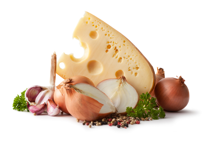 foods that contribute to bad breath like onions, garlic, and cheese.