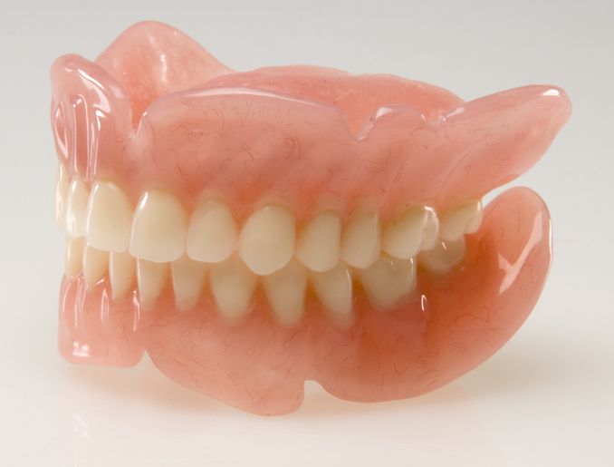 regular dentures on a white background